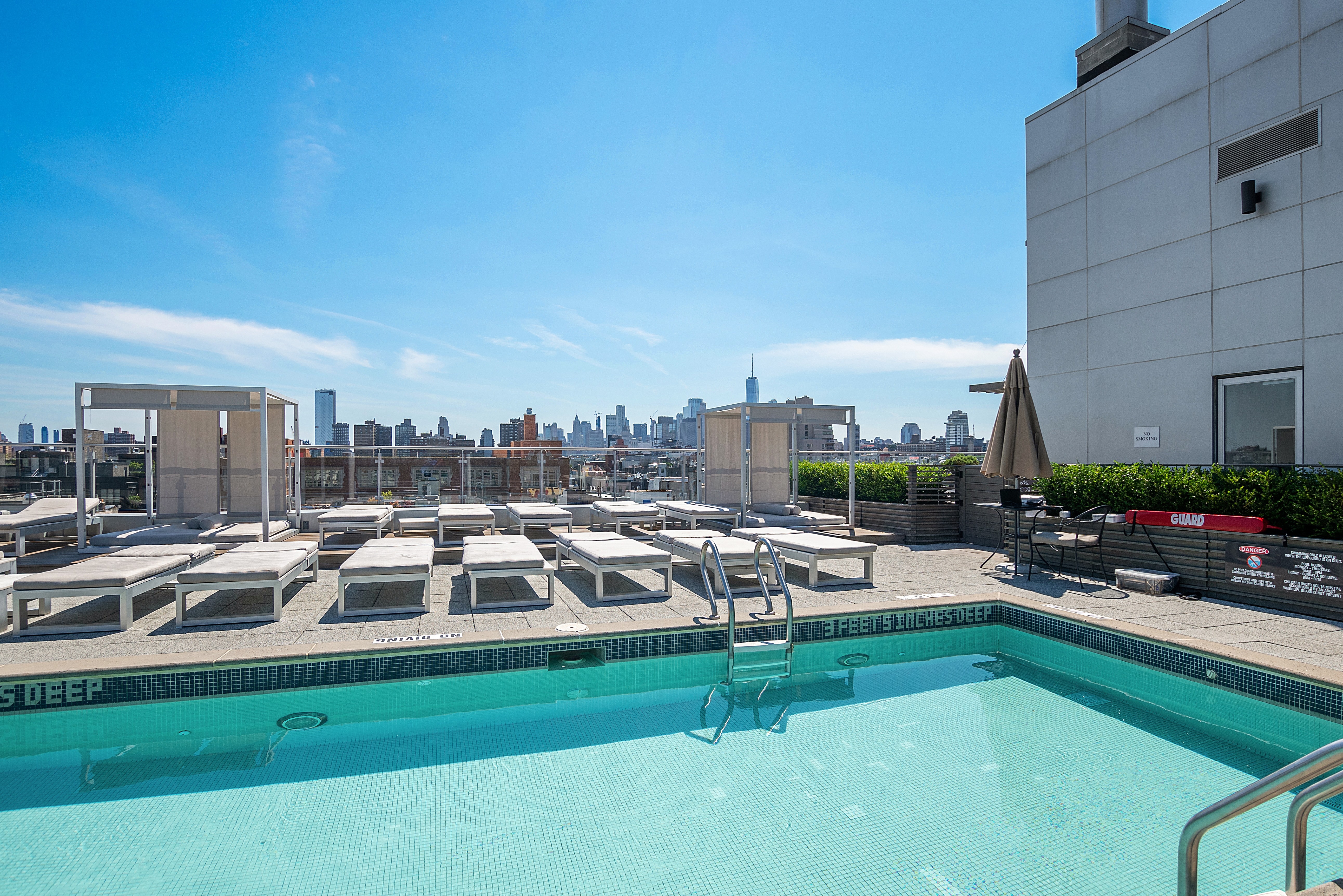 425 East 13th Street, Unit 3K Manhattan, NY 10009 - Photo 1 of 14 a view of a house with sitting area and swimming pool