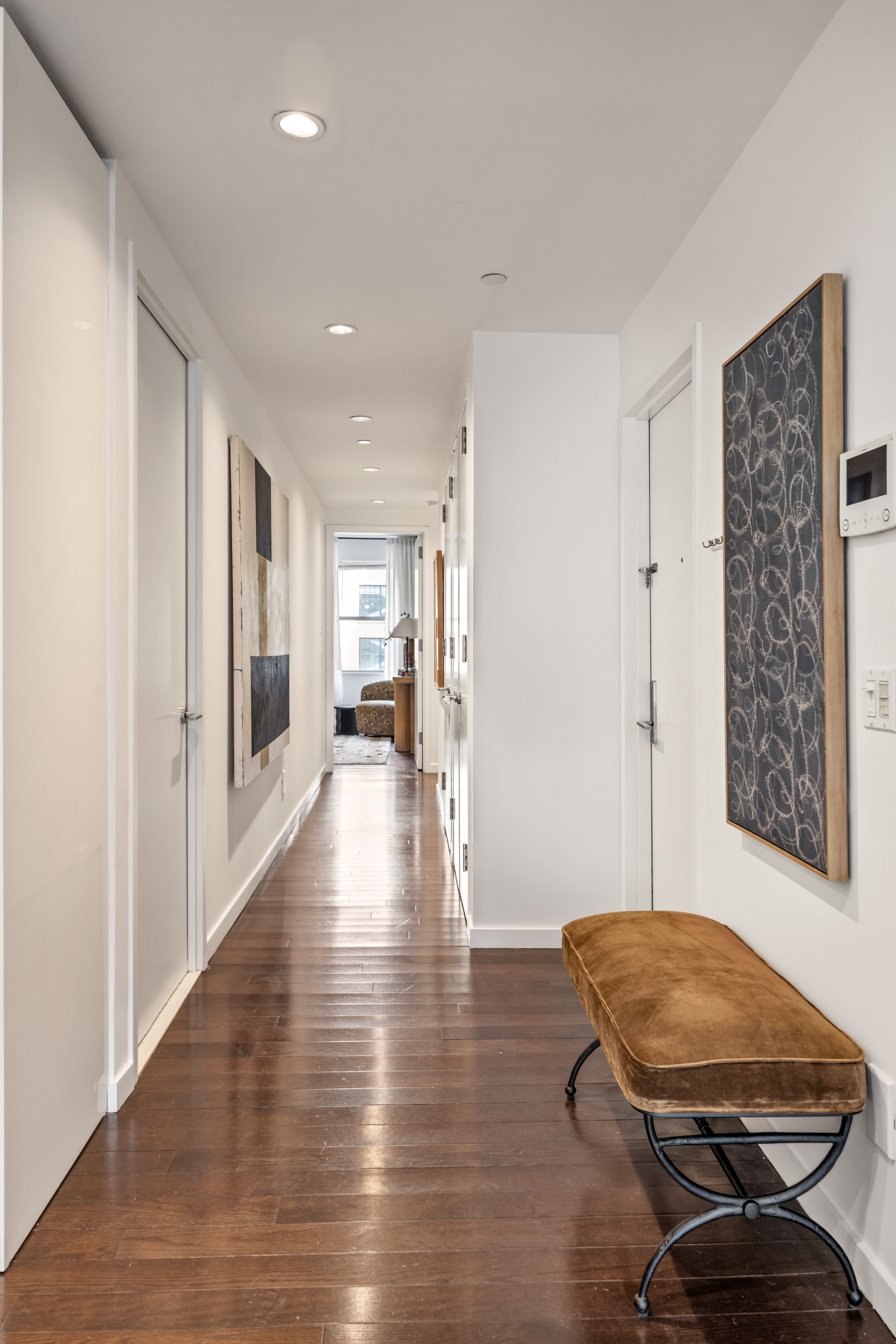 27 West 19th Street, Unit 6 Manhattan, NY 10011 - Photo 5 of 10 a room with furniture and a wooden floor