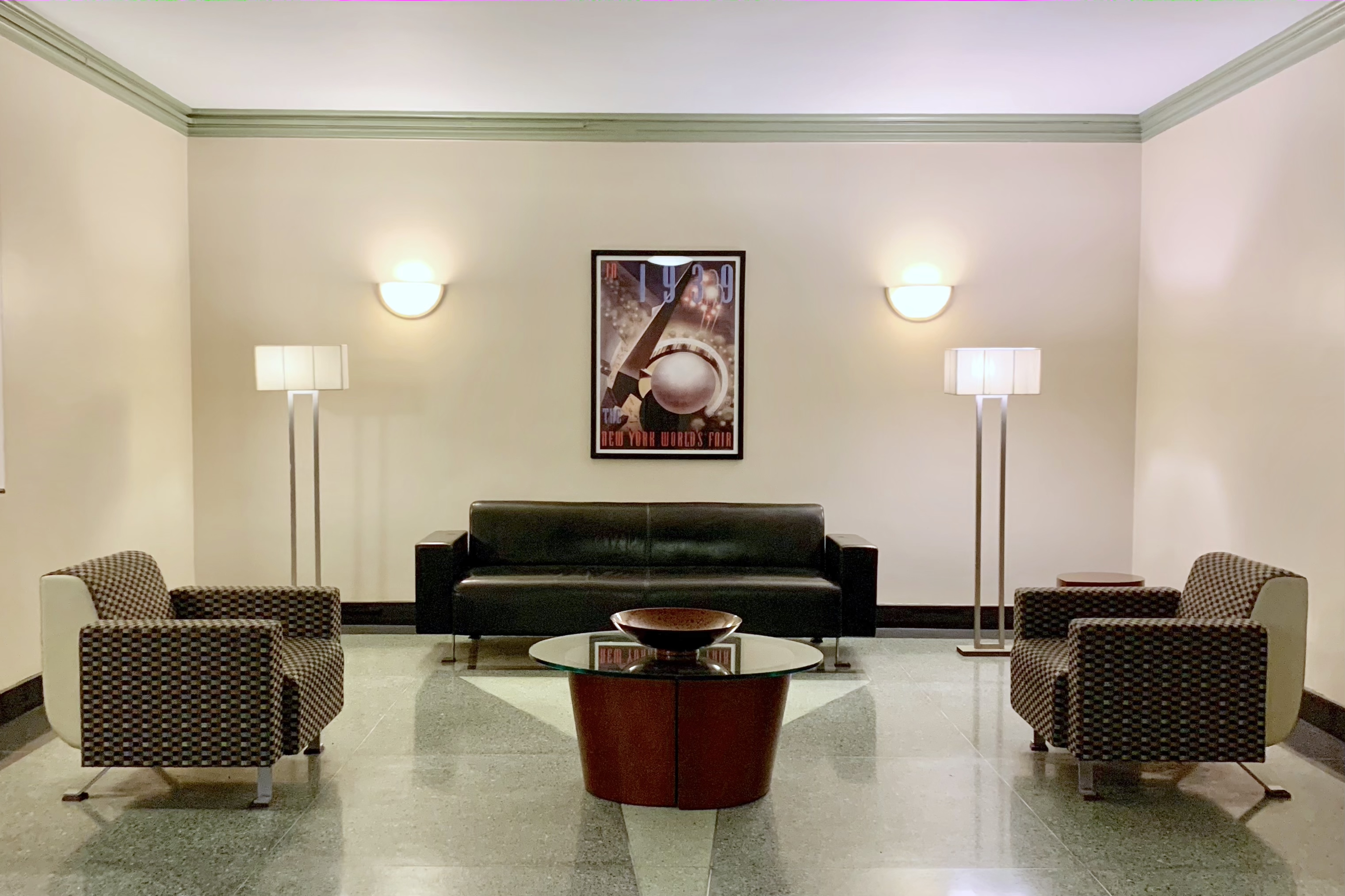 720 Fort Washington Avenue, Unit 5D Manhattan, NY 10040 - Photo 11 of 17 a living room with furniture and a lamp