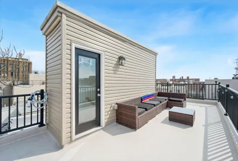 a building outdoor space with patio furniture