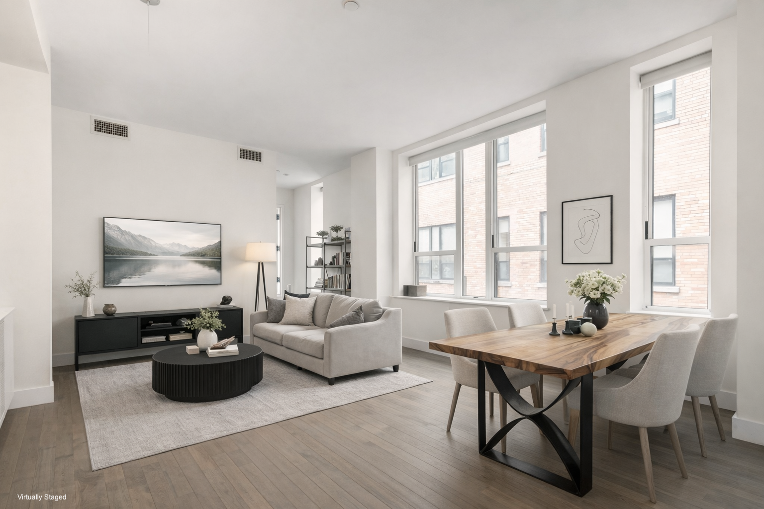 416 West 52nd Street, Unit 725 Manhattan, NY 10019 - Photo 1 of 15 a living room with furniture and a large window