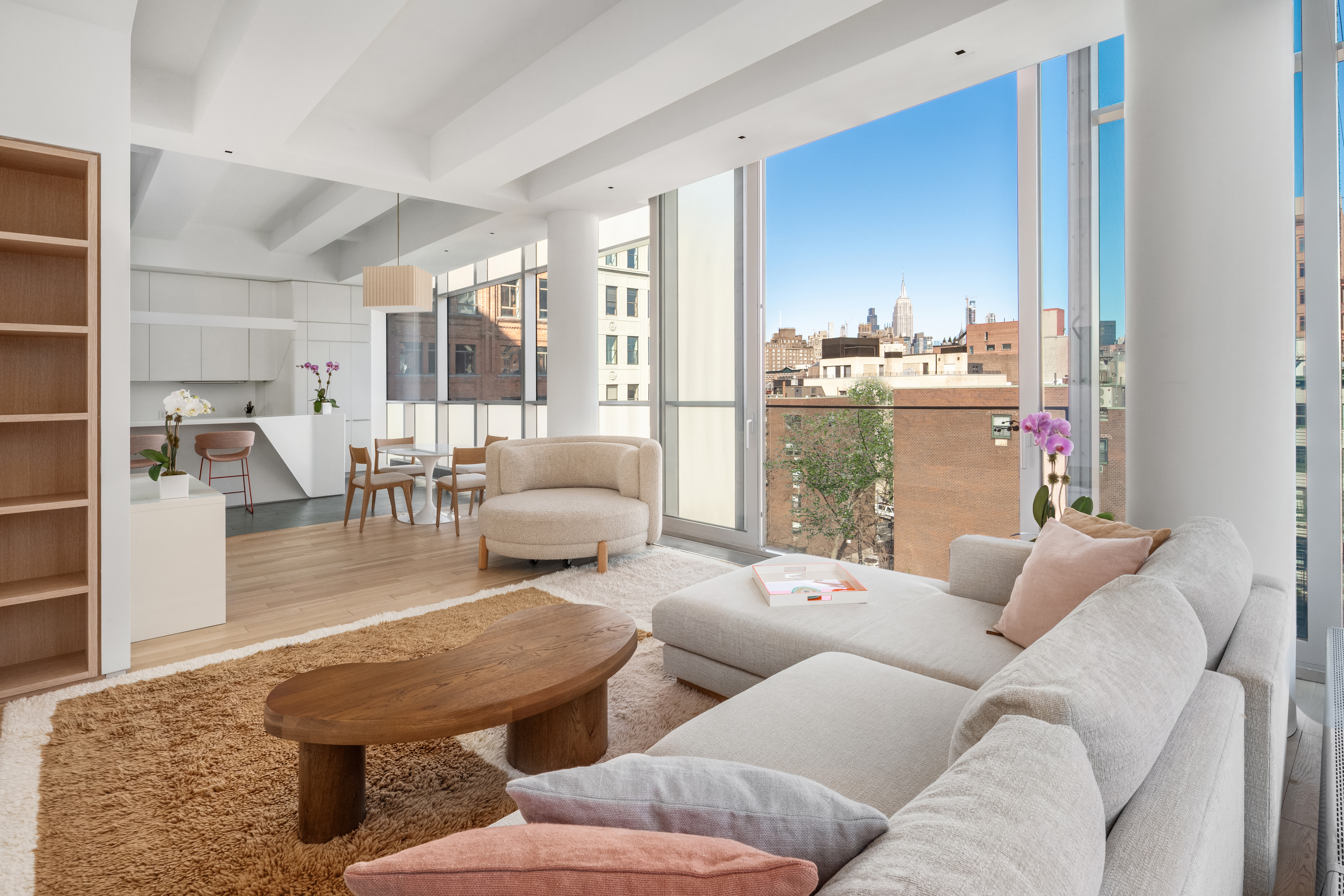 a living room with furniture and a table
