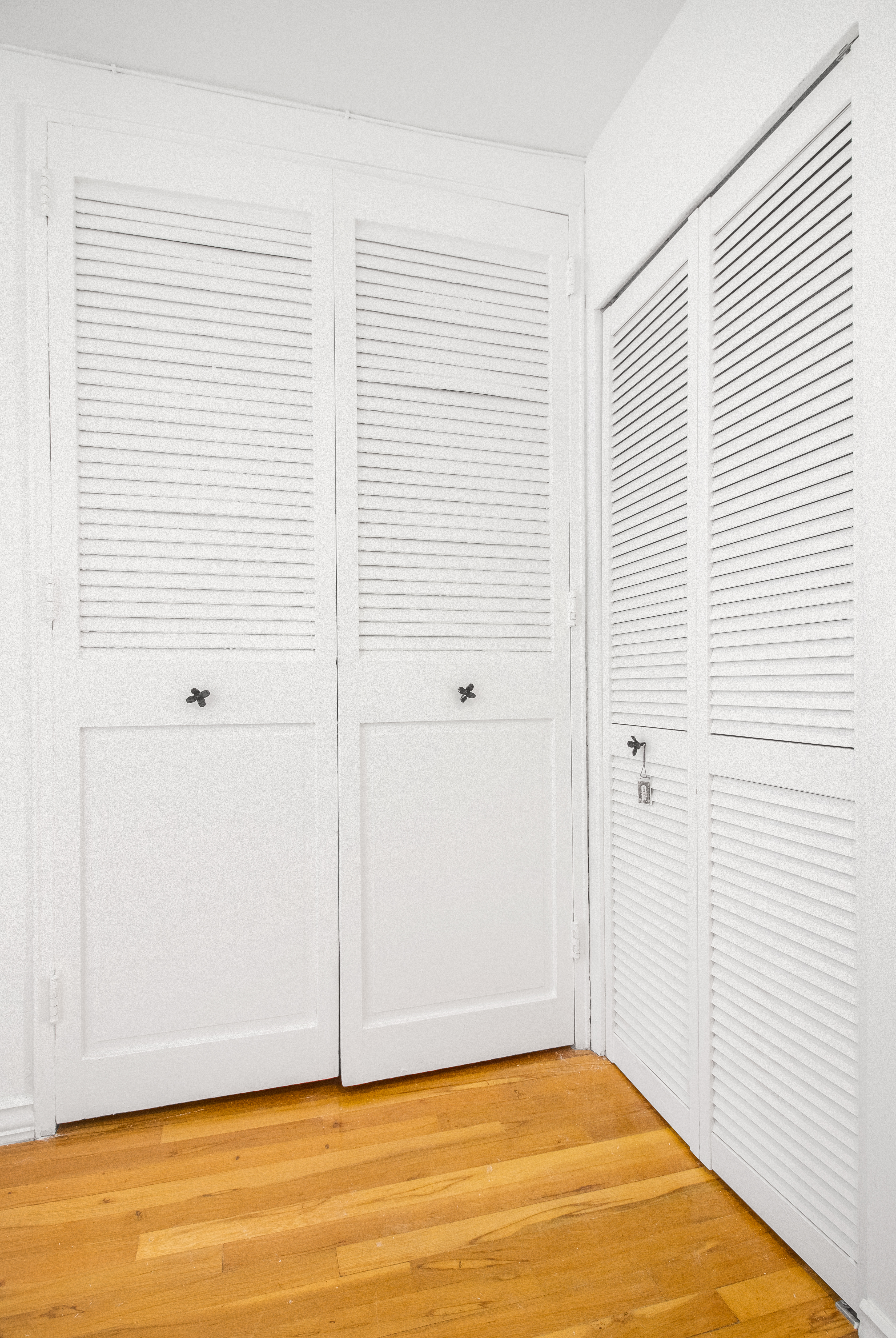 50-15 39th Street, Unit 4C Queens, NY 11104 - Photo 7 of 10 a view of an empty room with wooden floor