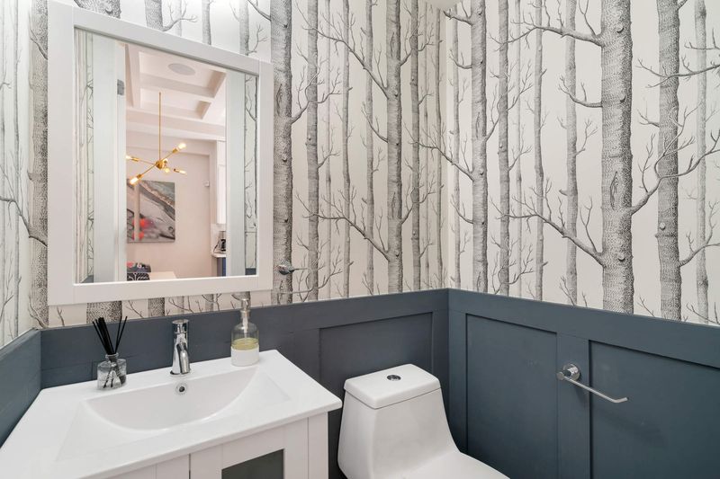 1118 Decatur Street Brooklyn, NY 11207 - Photo 5 of 18 a bathroom with a sink and a mirror