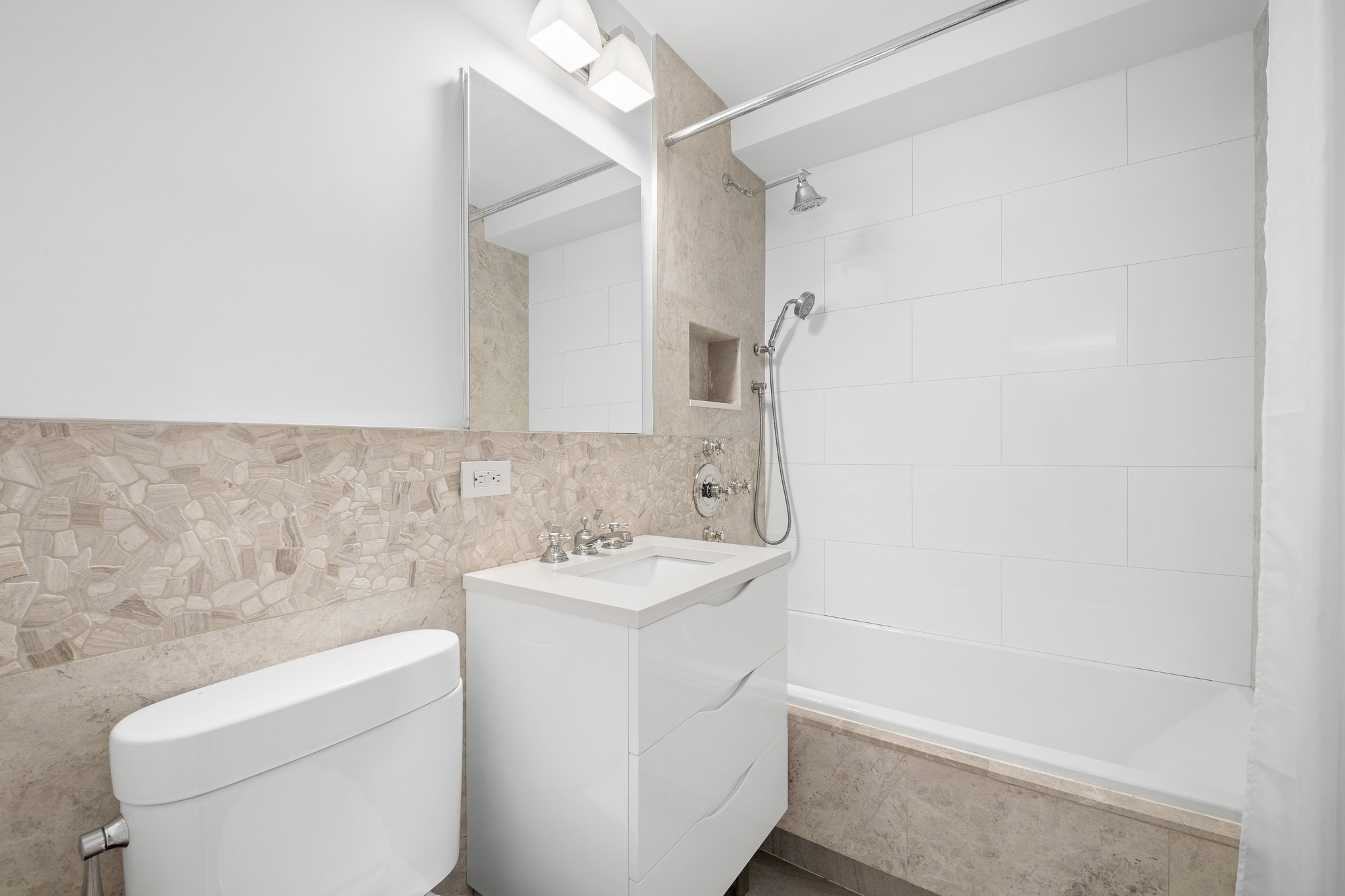 10 West 15th Street, Unit 1027/1028 Manhattan, NY 10011 - Photo 12 of 15 a bathroom with a sink toilet and shower