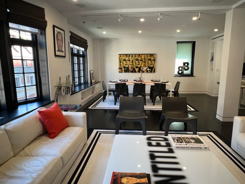 40 East 62nd Street, Unit 8E Manhattan, NY 10065 - Photo 10 of 24 a living room with furniture and wooden floor