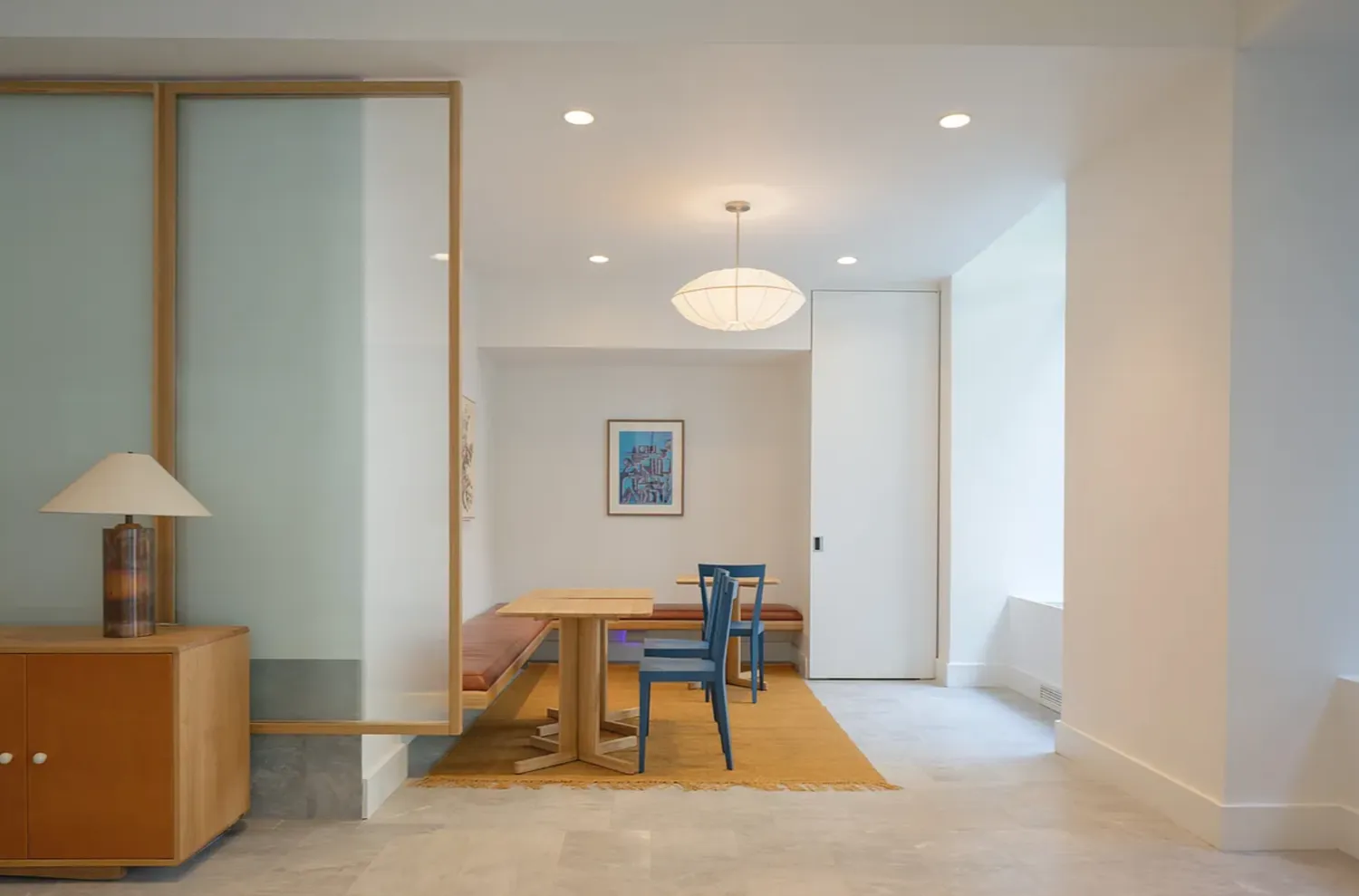 a living room with furniture and a table