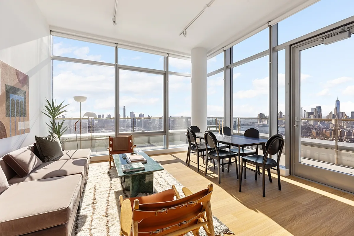 5 South 5th Street, Unit PH2B Brooklyn, NY 11249 - Photo 3 of 27 a living room with furniture and floor to ceiling windows