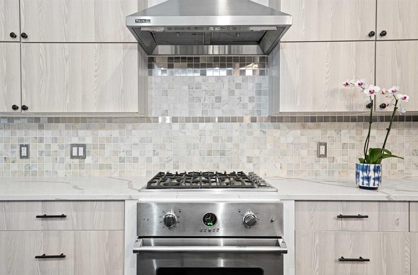 308 Clifton Place Brooklyn, NY 11216 - Photo 4 of 41 a kitchen with a stove and cabinets