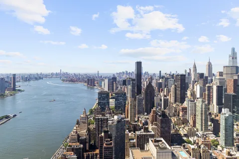 a view of a city with tall buildings