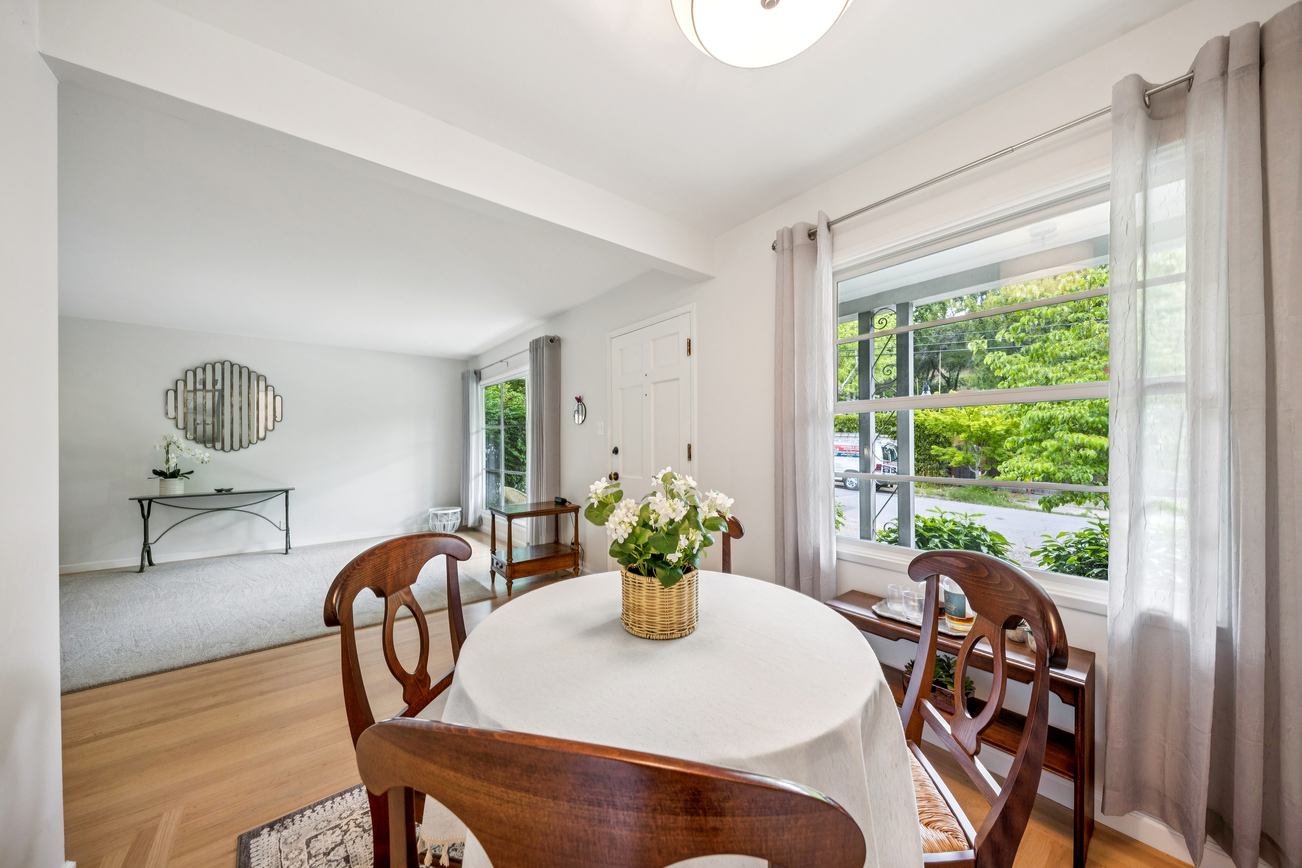 77 Bothin Road Fairfax, CA 94930 - Photo 4 of 32 a dining room with furniture and wooden floor