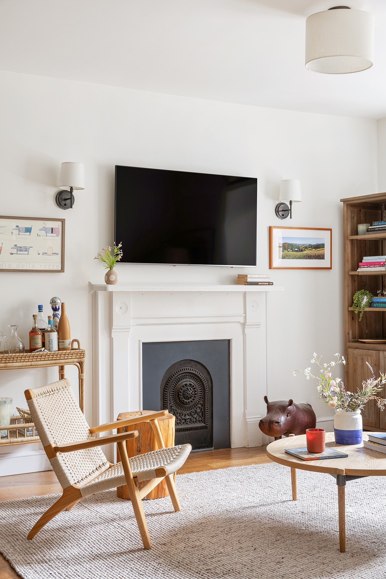 58 Strong Place, Unit 1D Brooklyn, NY 11231 - Photo 4 of 11 a living room with furniture a fireplace and a flat screen tv