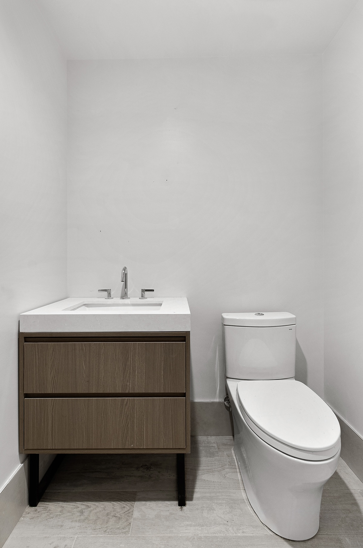 1098 Madison Street, Unit 1B Brooklyn, NY 11221 - Photo 14 of 16 a bathroom with a sink mirror and toilet