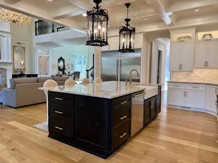 a kitchen with a sink and cabinets
