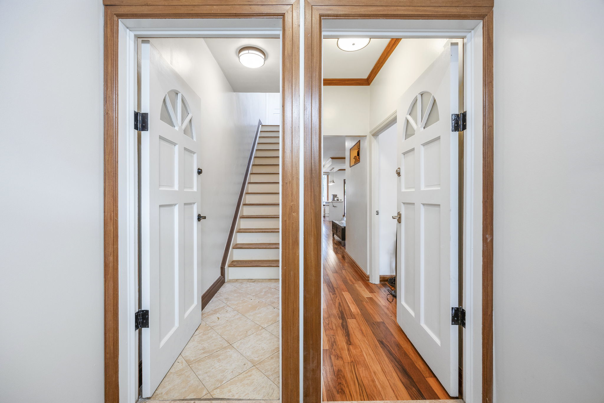 25-69 46th Street Queens, NY 11103 - Photo 3 of 33 a view of a hallway with wooden floor and entryway