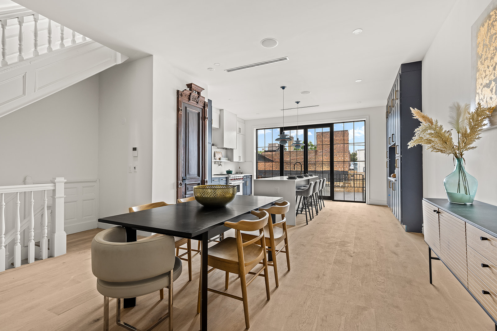 17 Linden Street Brooklyn, NY 11221 - Photo 5 of 19 a dining room with furniture and wooden floor