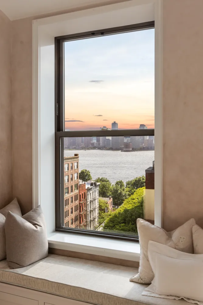 a bathroom with a sink toilet a mirror and shower