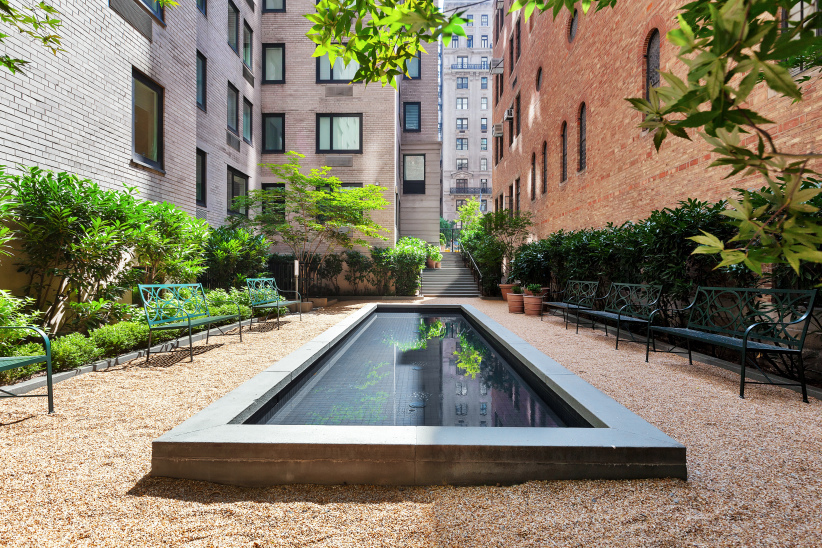 530 Park Avenue, Unit 12A Manhattan, NY 10065 - Photo 21 of 27 a view of swimming pool with outdoor seating