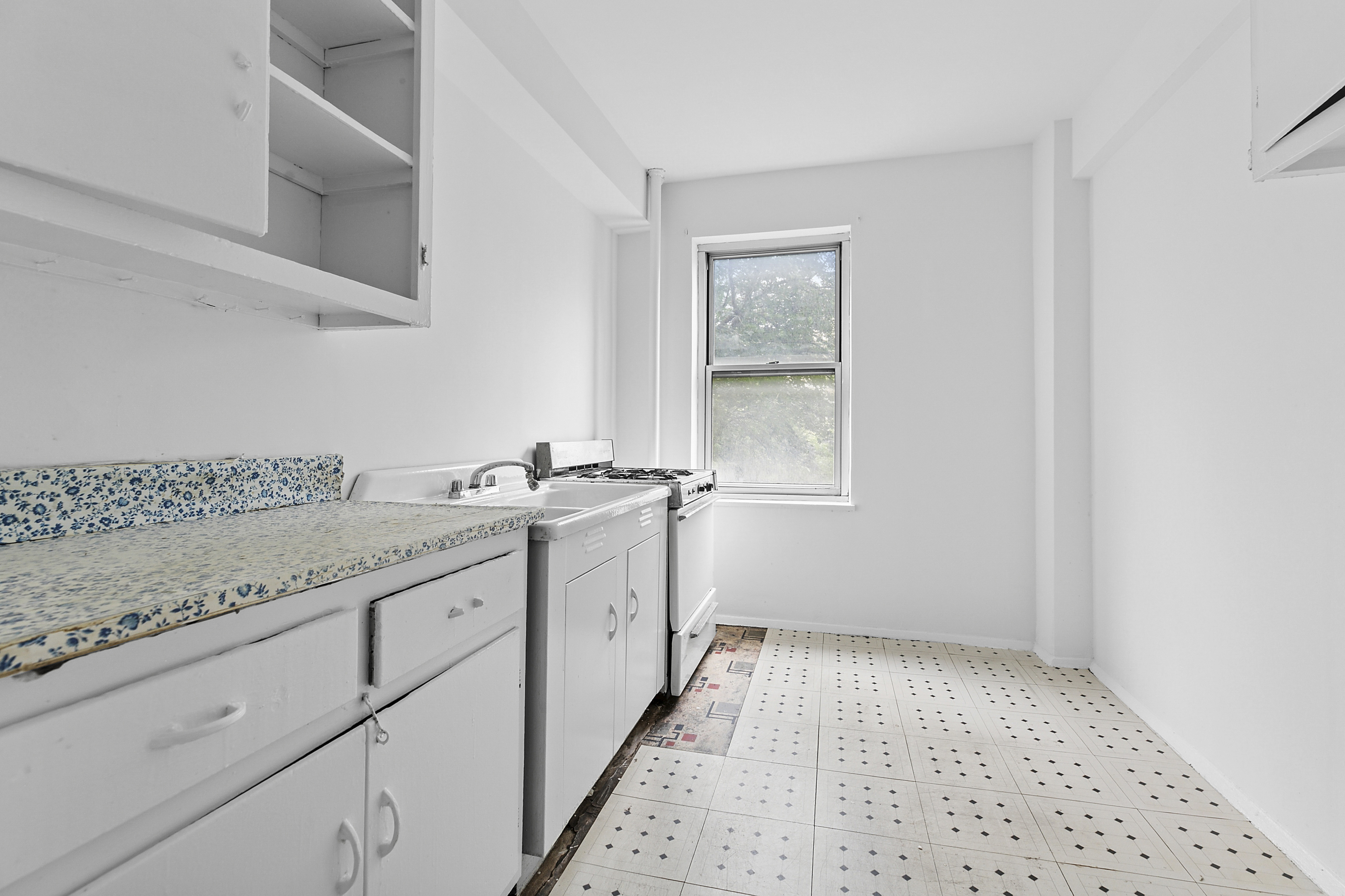 500 Grand Street, Unit C1D Manhattan, NY 10002 - Photo 6 of 8 a bathroom with a sink a vanity and a mirror