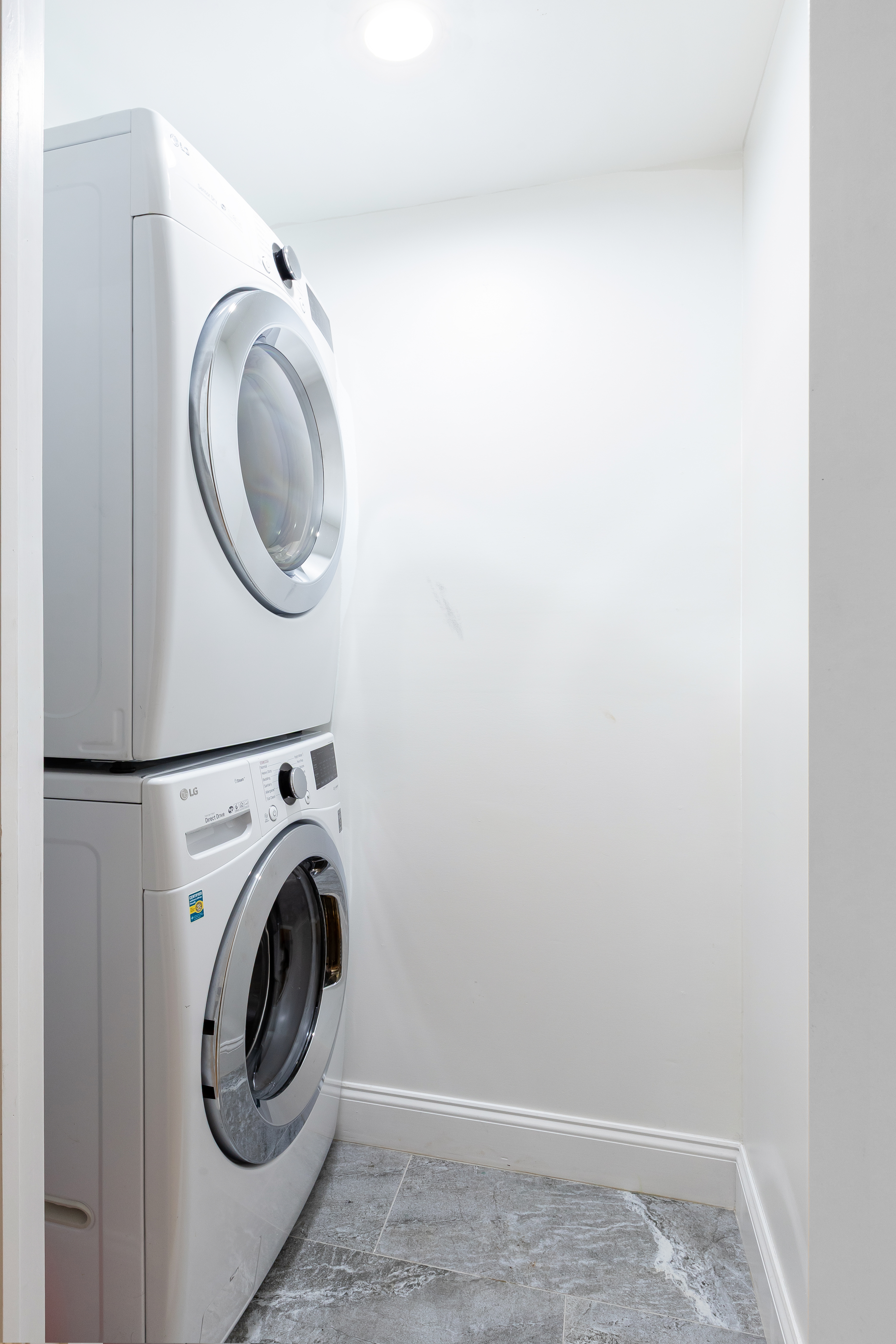 492 Warren Street, Unit GARDEN Brooklyn, NY 11217 - Photo 7 of 8 a utility room with dryer and washer