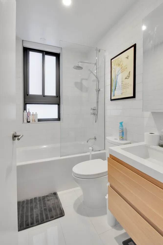 a bathroom with a sink a toilet and a bathtub