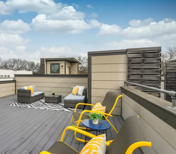 a view of a swimming pool with lounge chairs