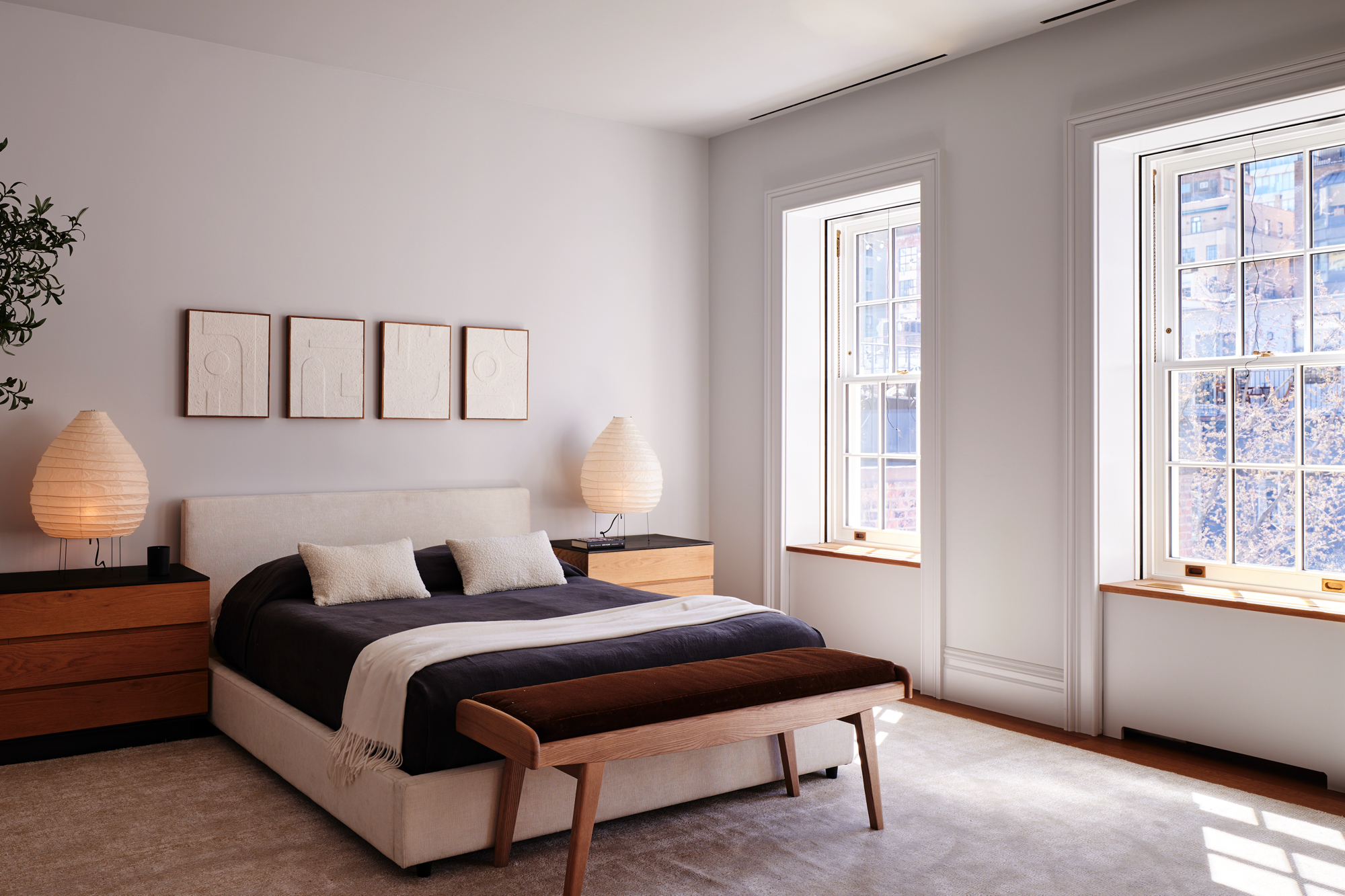 48-50 West 69th Street Manhattan, NY 10023 - Photo 18 of 33 a bedroom with a bed and window