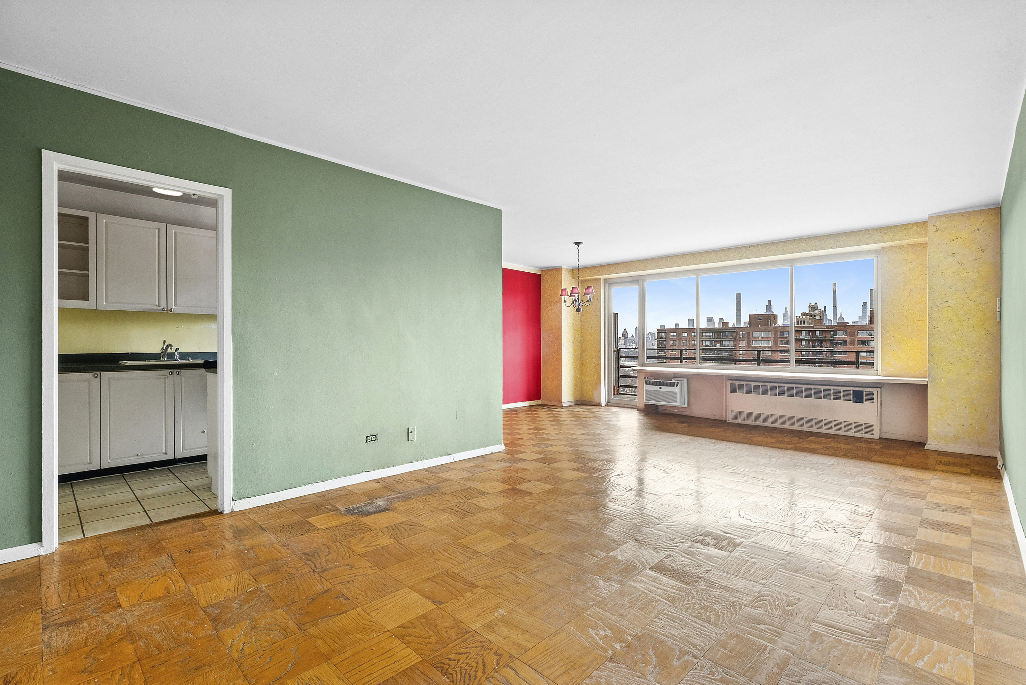 400 Central Park West, Unit 20B Manhattan, NY 10025 - Photo 4 of 11 a view of kitchen with refrigerator and window
