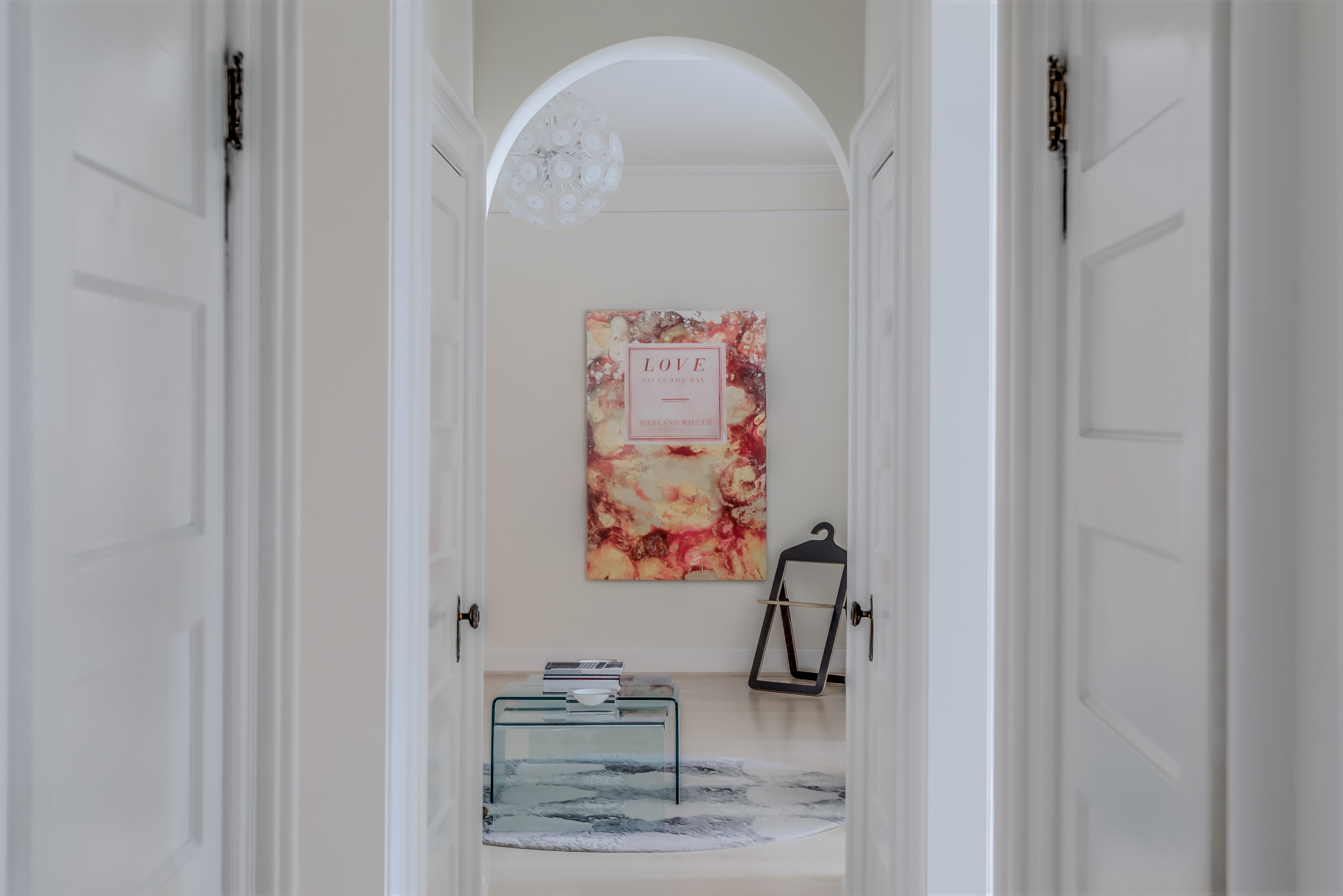 2022 Columbia Road Northwest, Unit 202 Washington, DC 20009 - Photo 3 of 15 a view of a hallway with paintings on the wall
