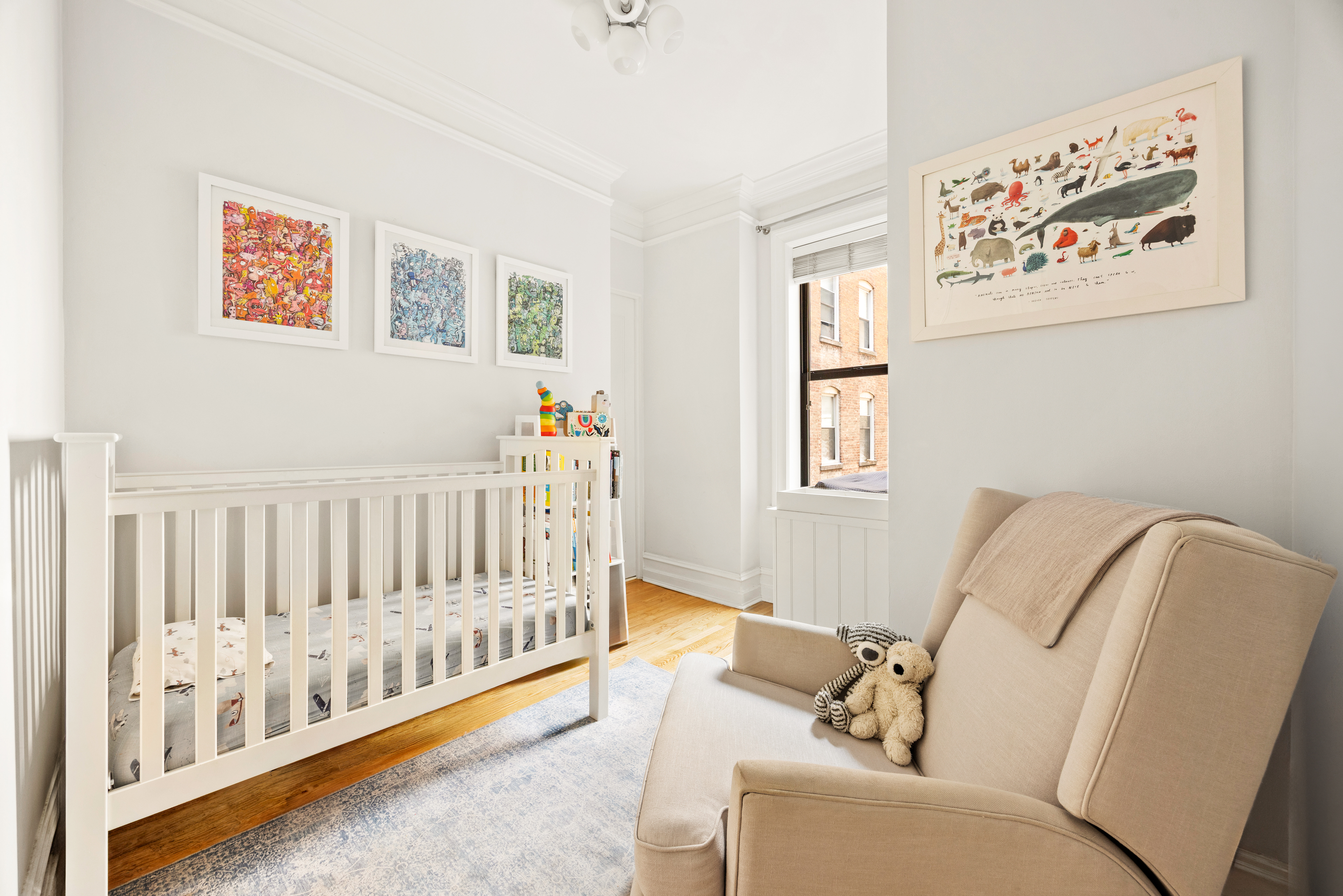 150 West 87th Street, Unit 7C Manhattan, NY 10024 - Photo 13 of 18 a living room with furniture and a window