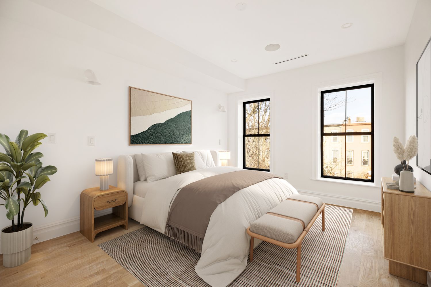 a bedroom with a bed and a potted plant