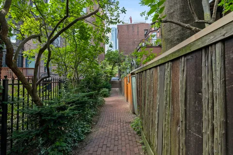a front view of a house having yard