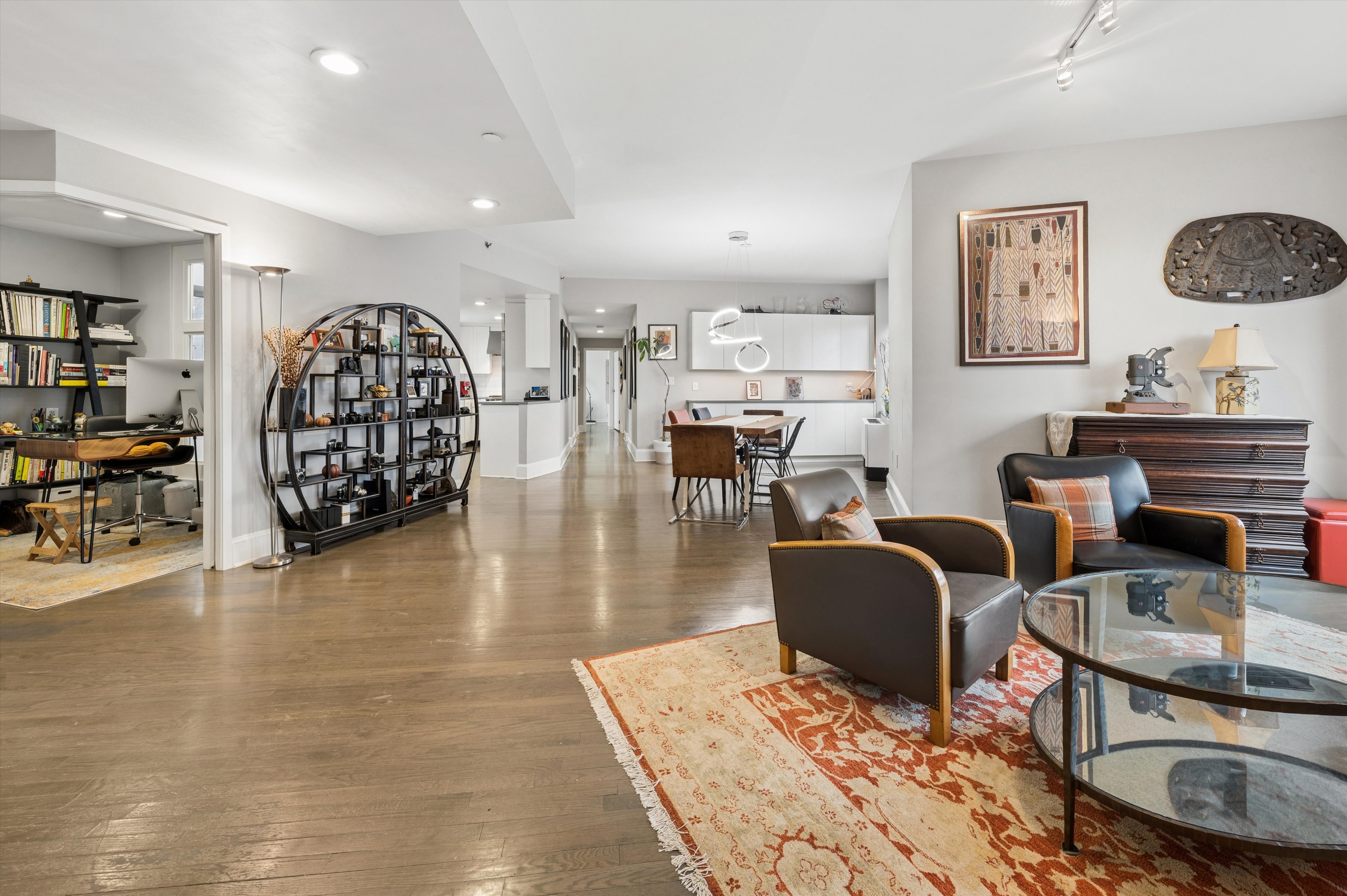 3625 Oxford Avenue, Unit 7C Bronx, NY 10463 - Photo 1 of 20 a living room with furniture a rug and a table