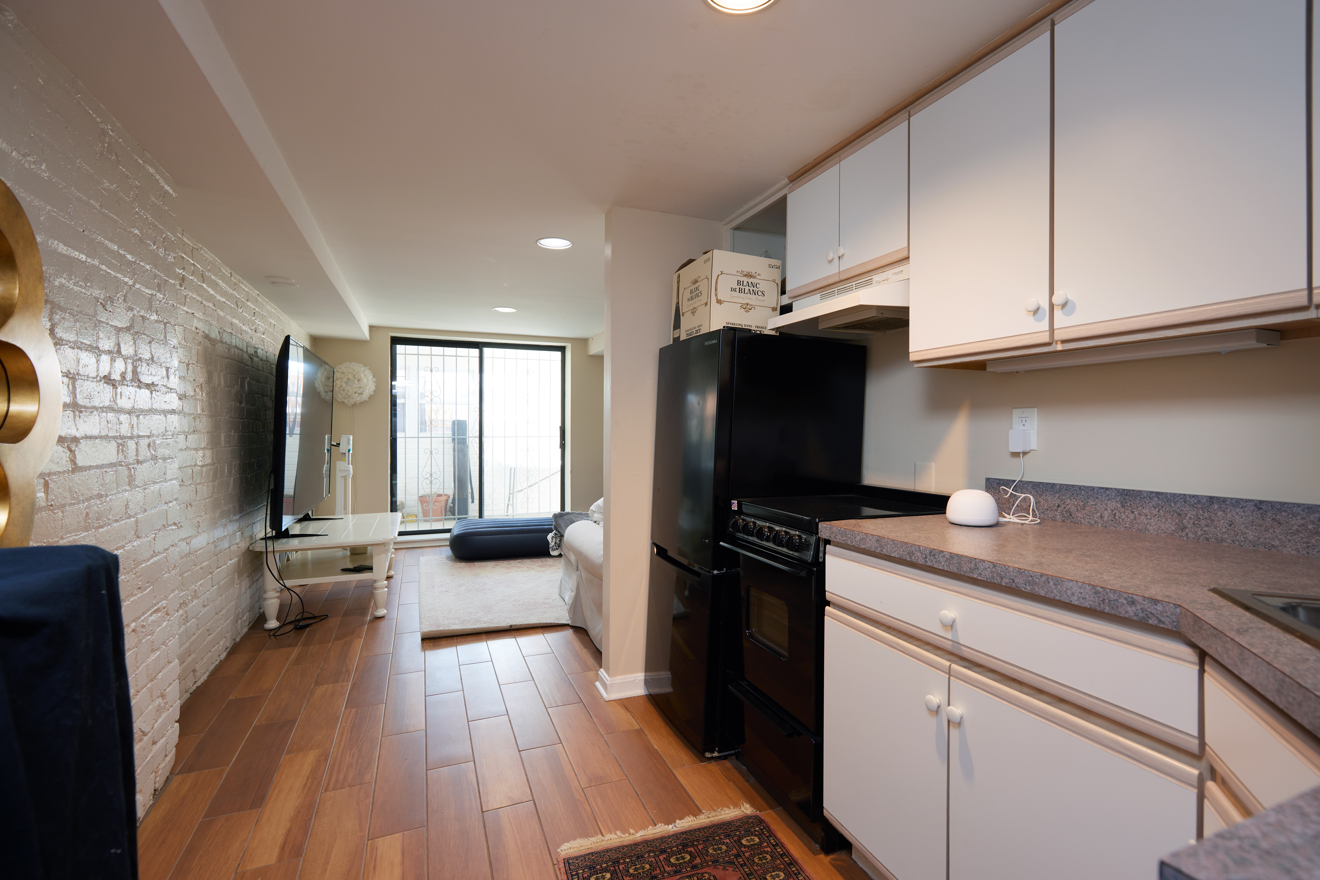 3420 R Street Northwest Washington, DC 20007 - Photo 16 of 53 a kitchen with granite countertop a refrigerator stove top oven and sink