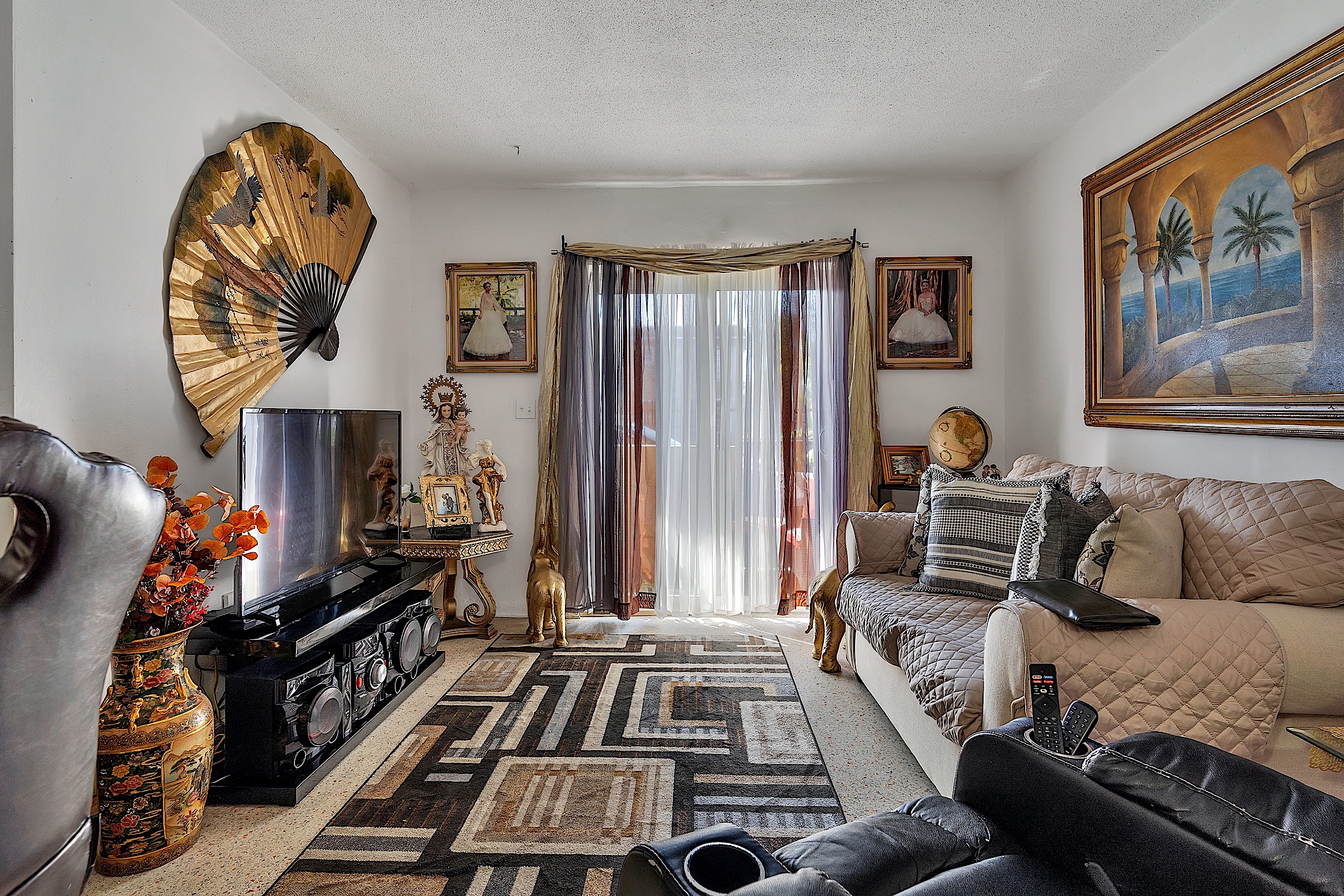 1361 Southwest 4th Street Miami, FL 33135 - Photo 10 of 23 a living room with furniture and a flat screen tv