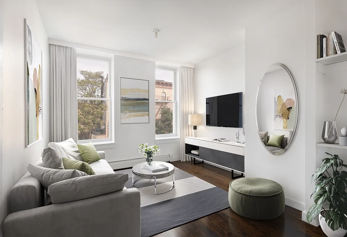 834 Halsey Street, Unit 2 Brooklyn, NY 11233 - Photo 1 of 10 a living room with furniture and a flat screen tv