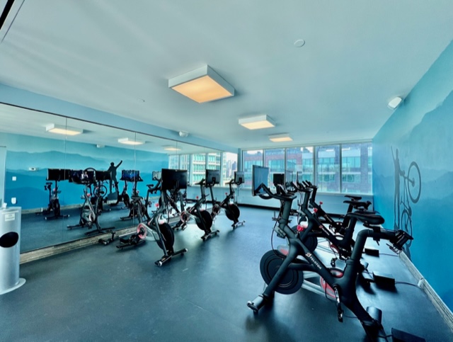 46-30 Center Boulevard, Unit 406 Queens, NY 11109 - Photo 12 of 24 a view of a room with gym equipment