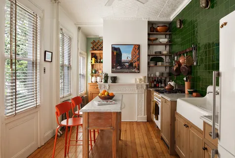 a kitchen that has a cabinets and a stove