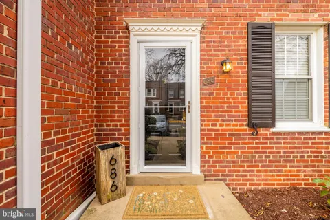 a view of a brick house with a door