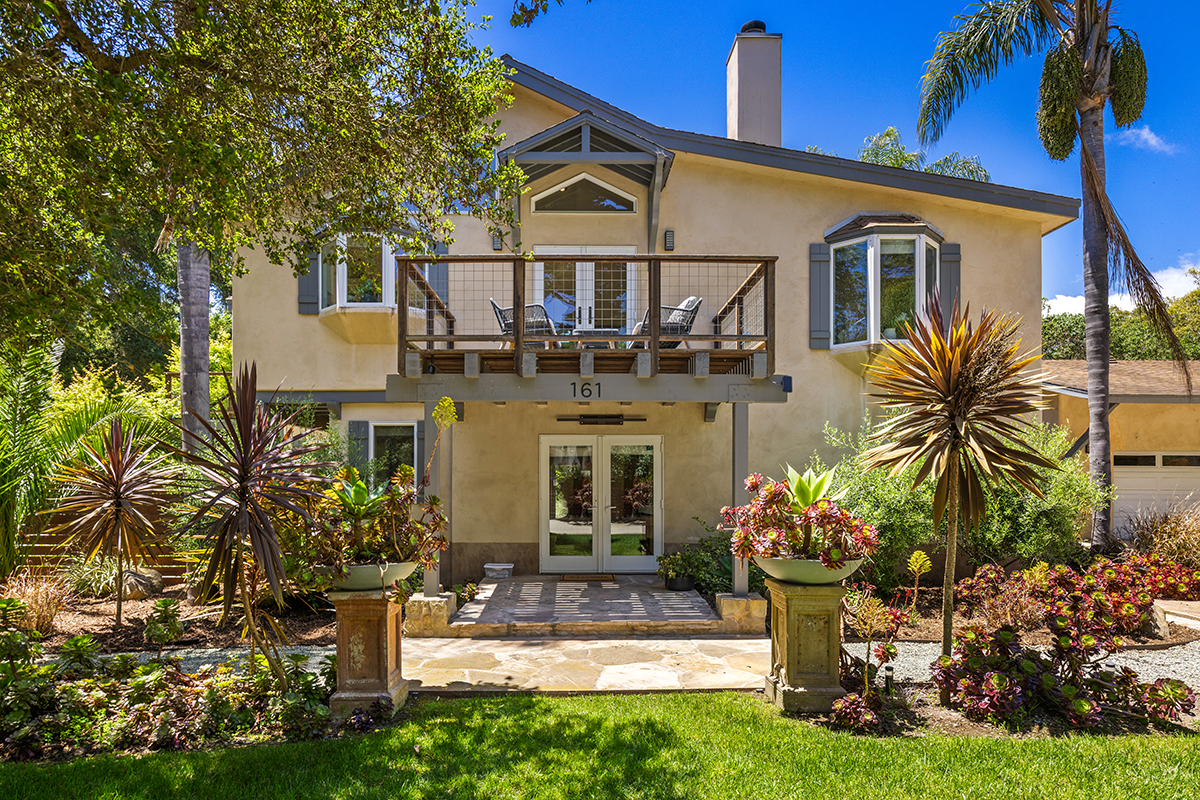 161 Loureyro Road Montecito, CA 93108 - Photo 2 of 52 a front view of a house with a garden