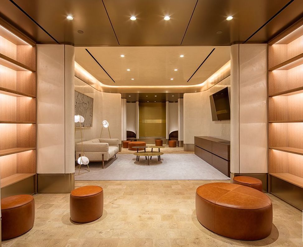 551 West 21st Street, Unit 4D Manhattan, NY 10011 - Photo 12 of 16 a living room with furniture and a potted plant