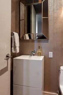 a close view of sink and mirror