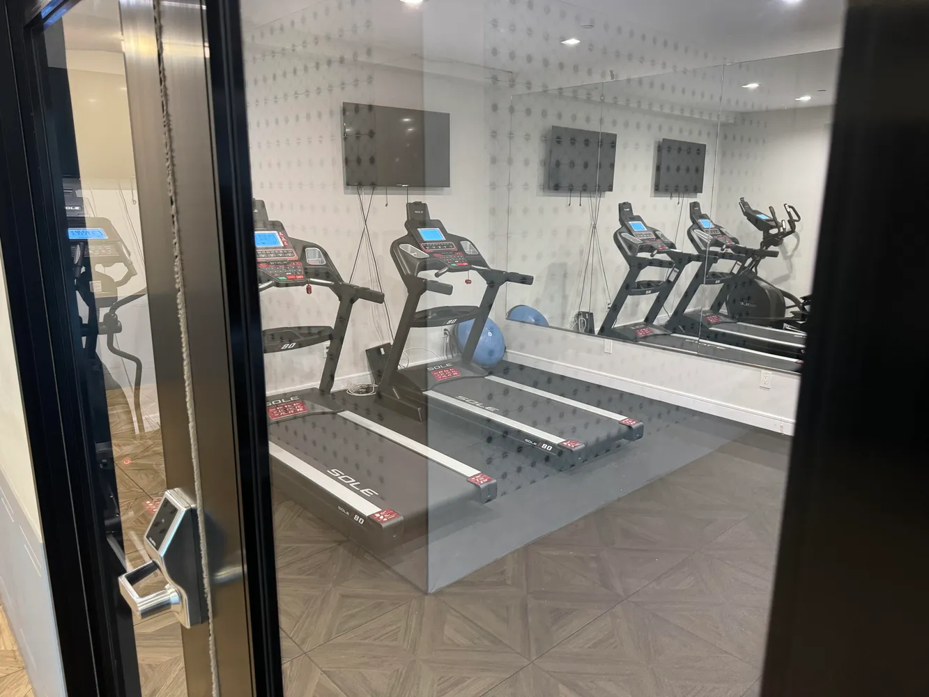 a view of a room with gym equipment