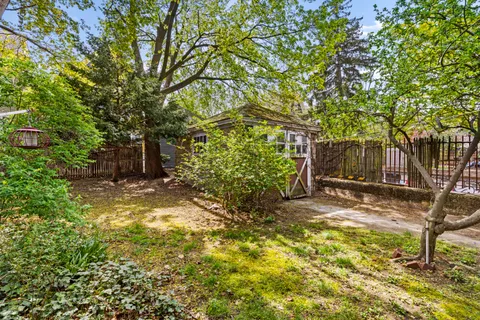 a backyard of a house with lots of green space