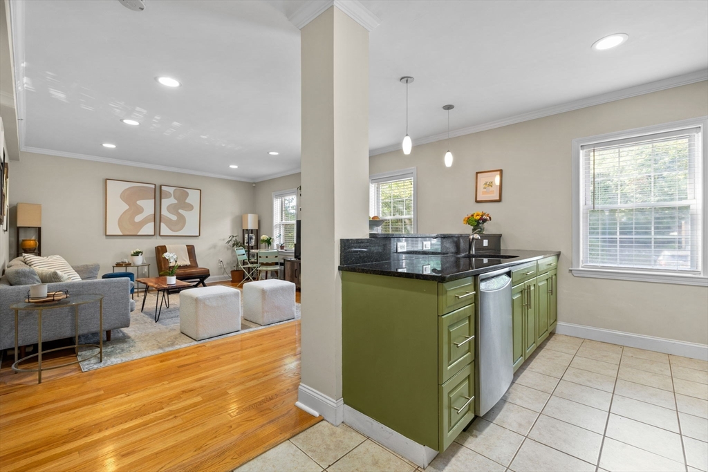 27-29 Commonwealth Avenue, Unit 9 Newton, MA 02467 - Photo 5 of 20 a kitchen with sink and cabinets