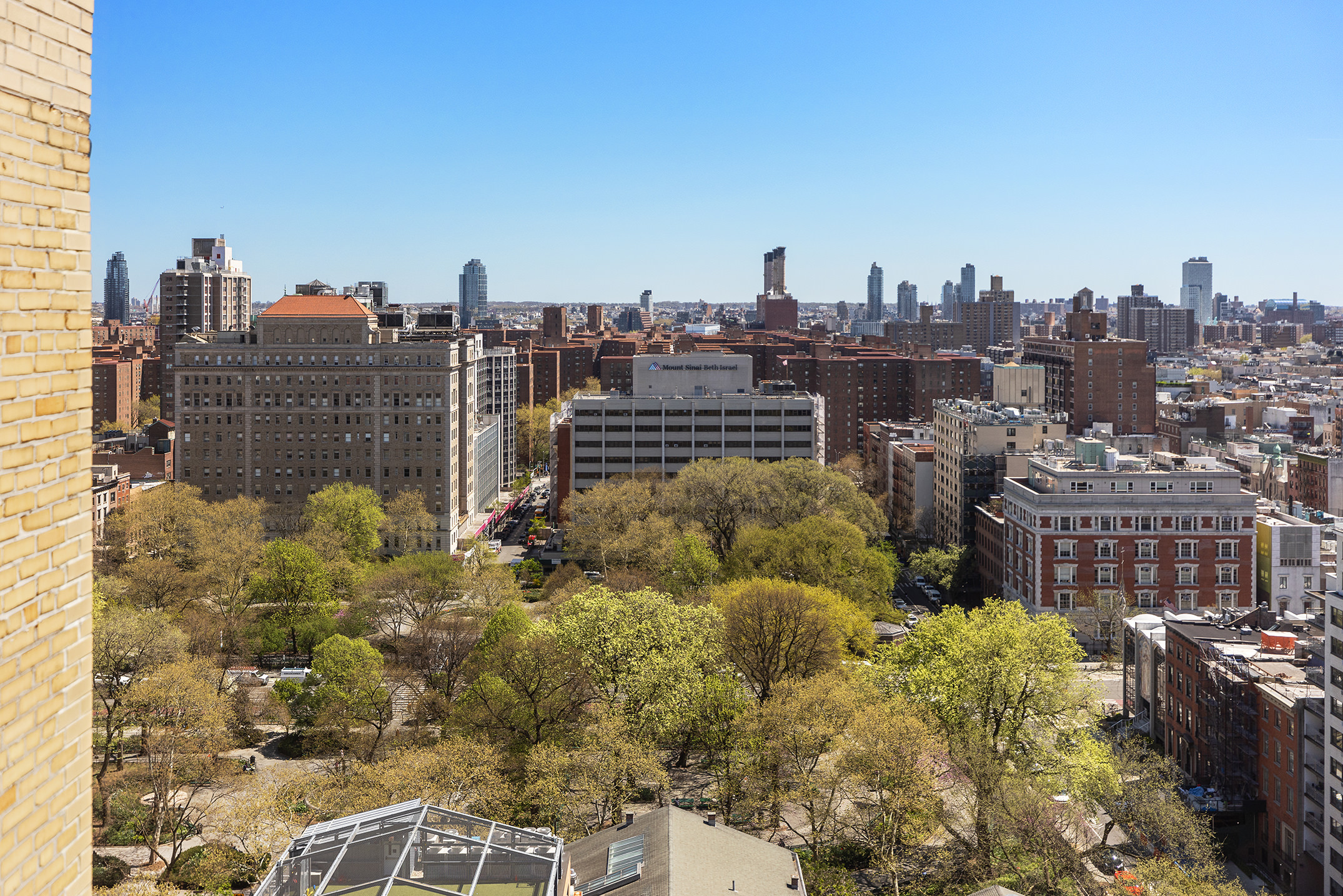 200 East 16th Street, Unit 19D Manhattan, NY 10003 - Photo 10 of 14 a view of a city with tall buildings