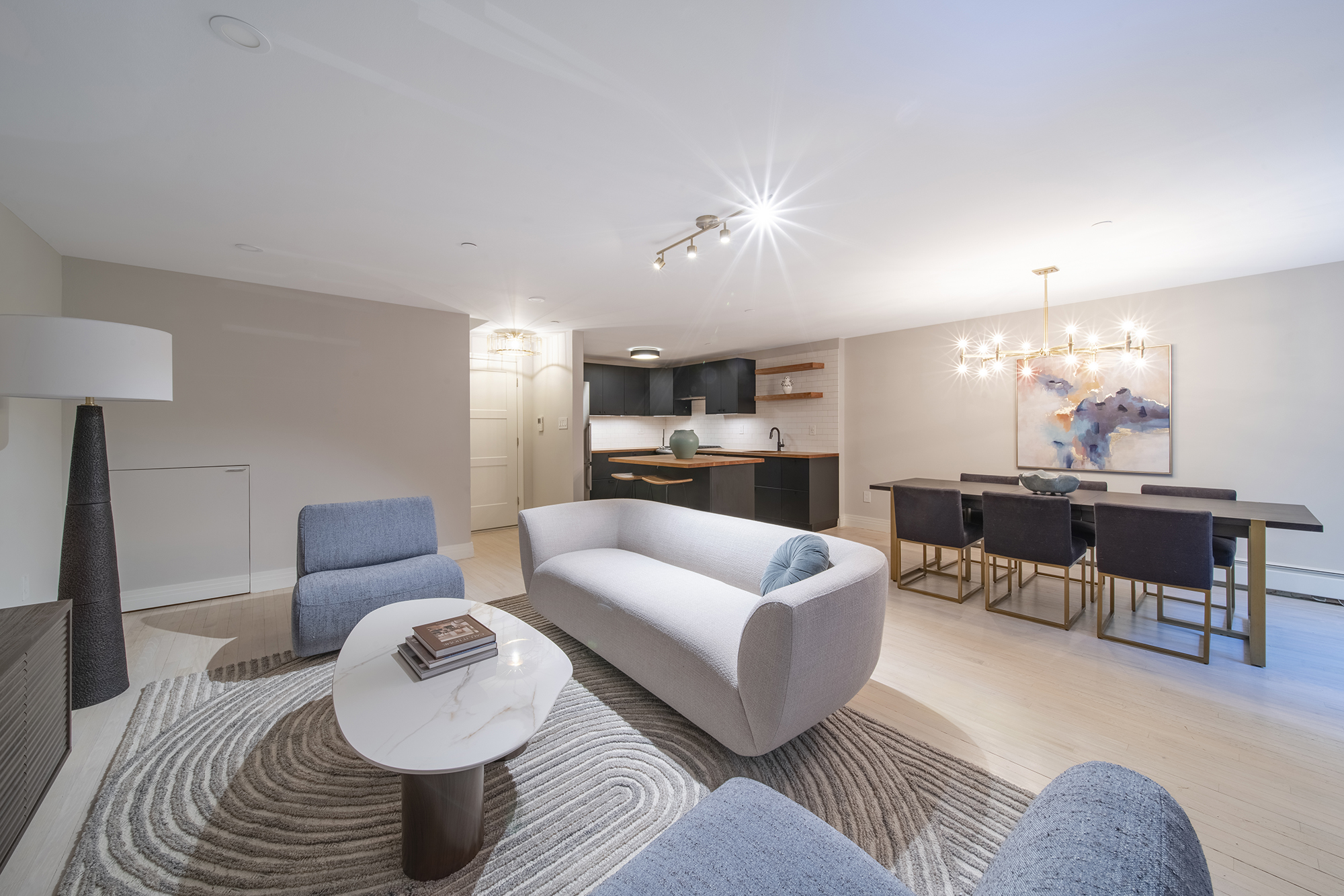 407 East 12th Street, Unit 1RSE Manhattan, NY 10009 - Photo 3 of 13 a living room with furniture and a table