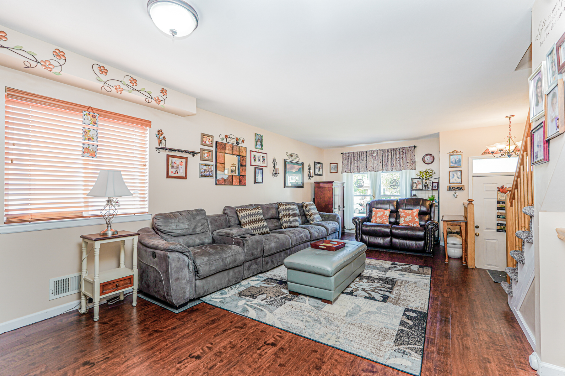287 Greaves Avenue Staten Island, NY 10308 - Photo 5 of 35 a living room with furniture or couch and a wooden floor
