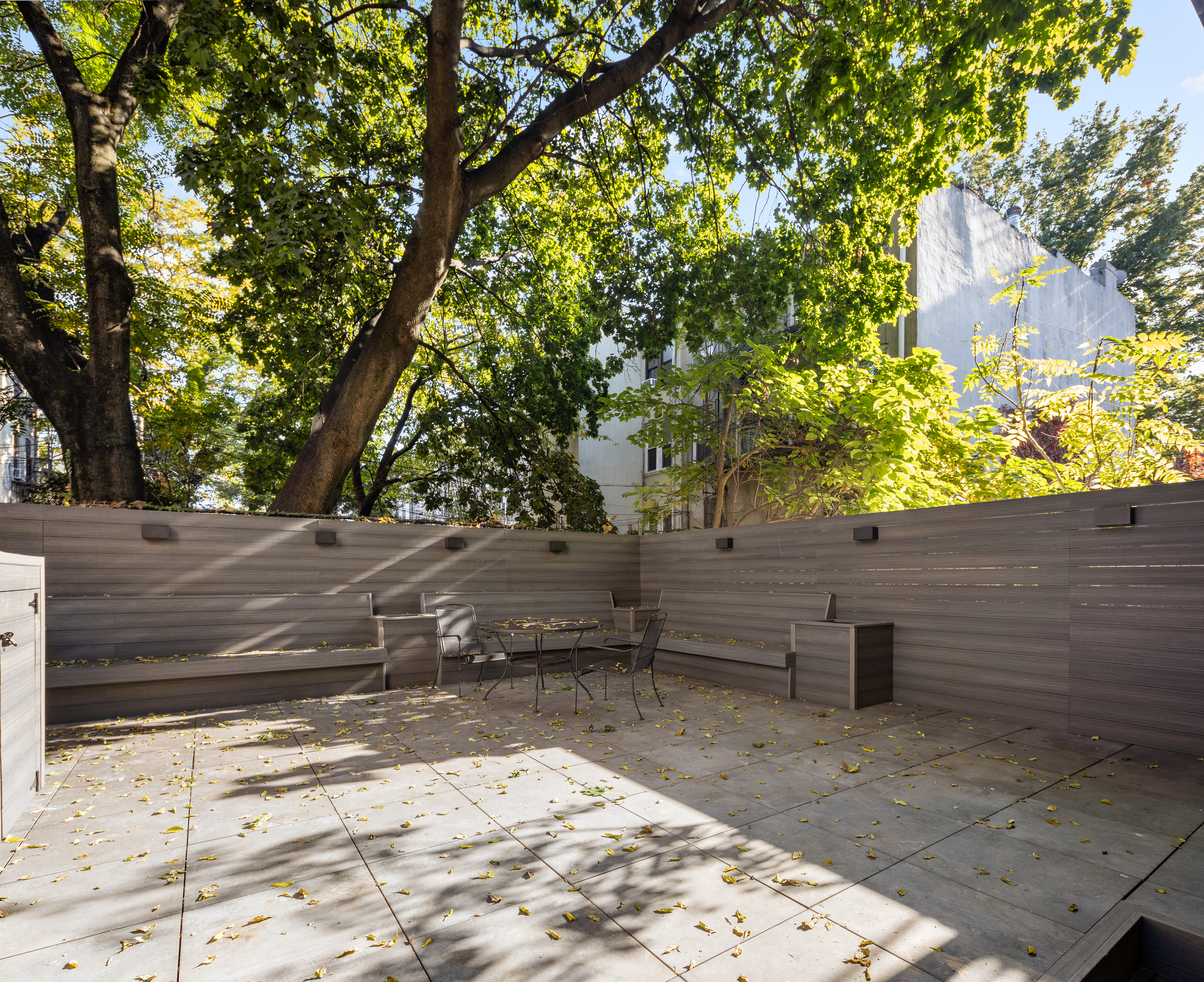 1671 8th Avenue, Unit 3L Brooklyn, NY 11215 - Photo 5 of 7 a view of a backyard with trees