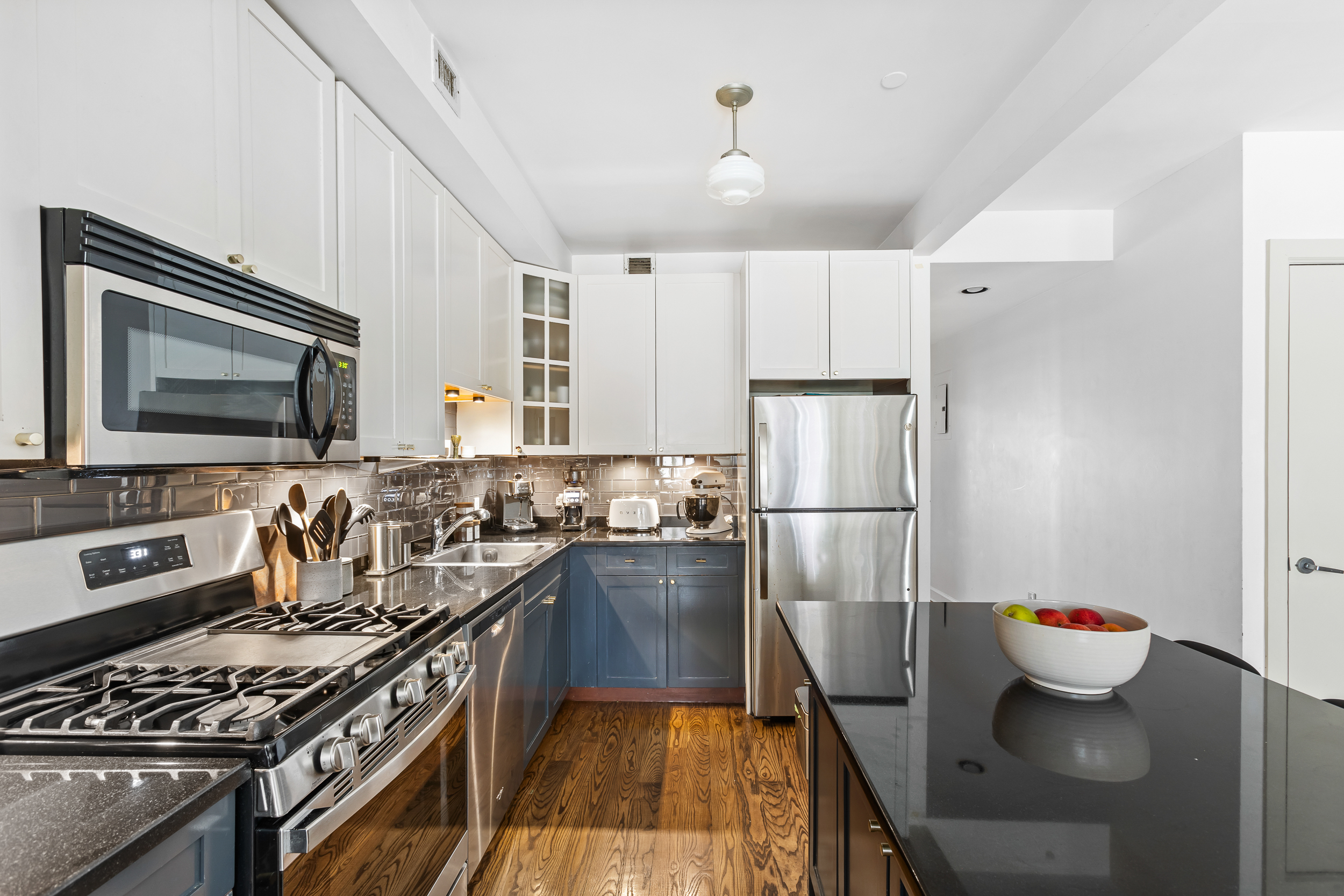 310 2nd Street, Unit 3C Brooklyn, NY 11215 - Photo 4 of 14 a kitchen with sink a stove and refrigerator